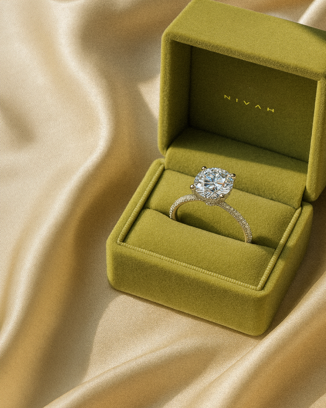 NIVAH luxury engagement ring in signature green box
